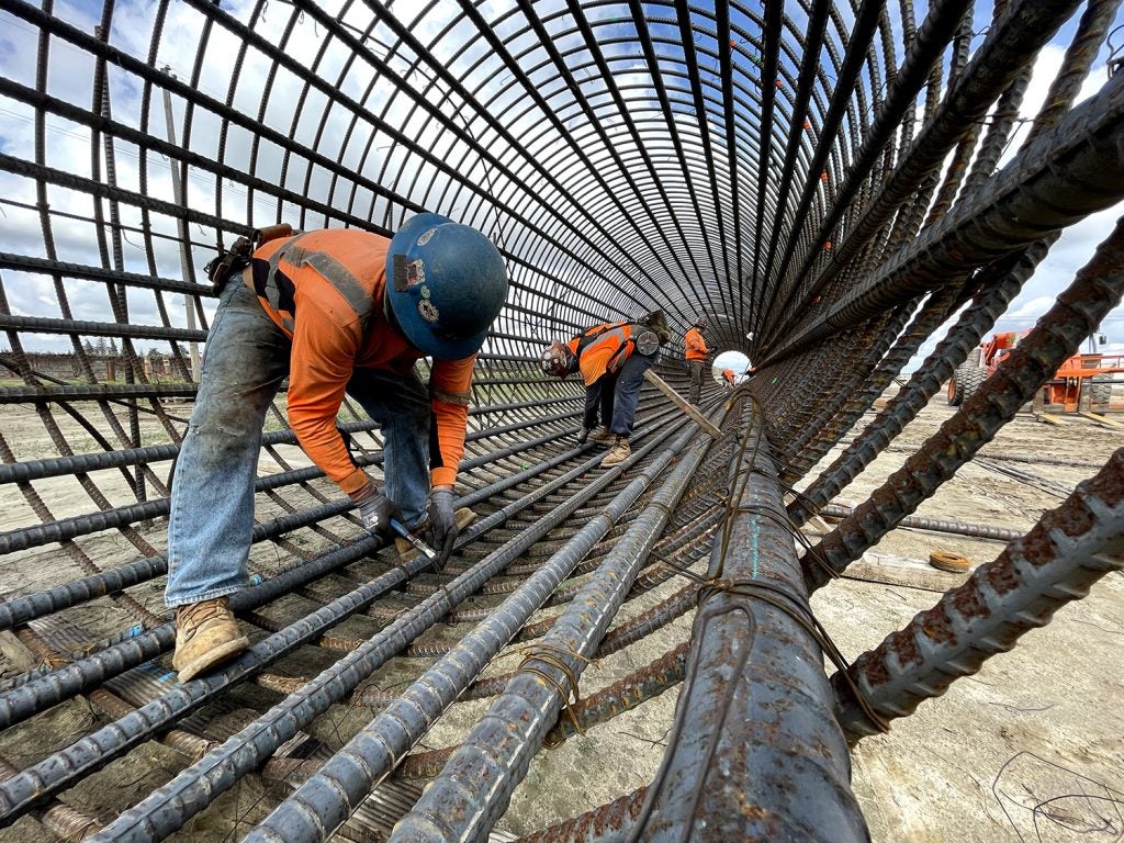 photo of workers constructing the Conejo viaduct as part of the california high speed rail project