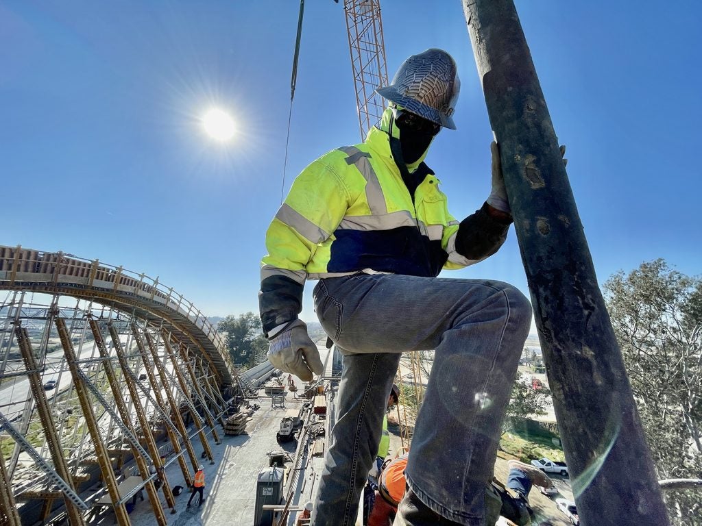 photo of a construction worker on the cedar viaduct in fresno, california