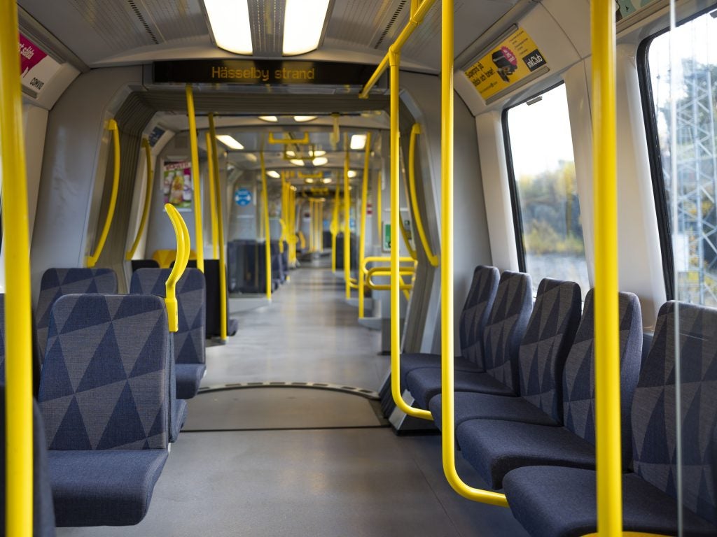 A view of the refurbished interior of the C20 cars with seats along the side of the carriage on one half
